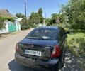 Черный Дэу Джентра, объемом двигателя 1.5 л и пробегом 69 тыс. км за 4356 $, фото 1 на Automoto.ua