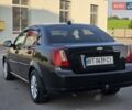 Черный Дэу Джентра, объемом двигателя 1.5 л и пробегом 180 тыс. км за 3999 $, фото 11 на Automoto.ua