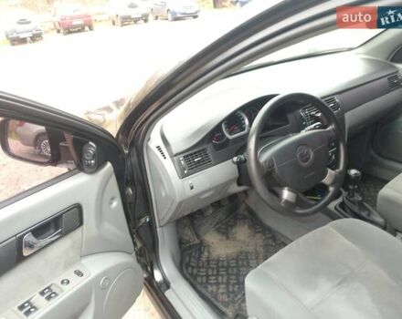 Чорний Деу Джентра, об'ємом двигуна 1.49 л та пробігом 112 тис. км за 4730 $, фото 5 на Automoto.ua