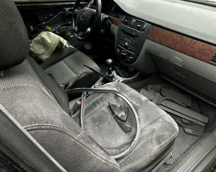 Черный Дэу Джентра, объемом двигателя 1.5 л и пробегом 195 тыс. км за 2350 $, фото 3 на Automoto.ua