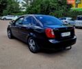 Чорний Деу Джентра, об'ємом двигуна 1.5 л та пробігом 180 тис. км за 3950 $, фото 1 на Automoto.ua