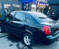 Черный Дэу Джентра, объемом двигателя 1.5 л и пробегом 350 тыс. км за 4000 $, фото 1 на Automoto.ua