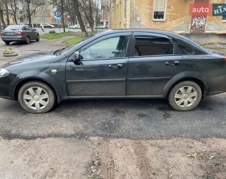 Черный Дэу Джентра, объемом двигателя 1.49 л и пробегом 82 тыс. км за 6000 $, фото 2 на Automoto.ua