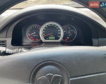 Черный Дэу Джентра, объемом двигателя 1.49 л и пробегом 82 тыс. км за 6000 $, фото 1 на Automoto.ua