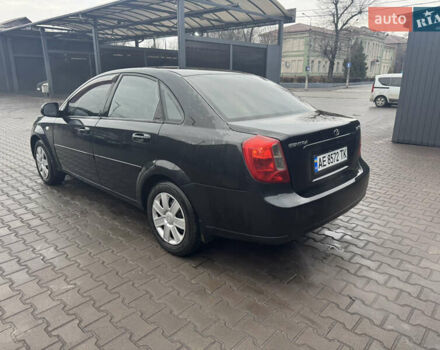 Черный Дэу Джентра, объемом двигателя 1.49 л и пробегом 267 тыс. км за 4400 $, фото 4 на Automoto.ua