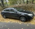 Черный Дэу Джентра, объемом двигателя 1.5 л и пробегом 264 тыс. км за 3700 $, фото 1 на Automoto.ua