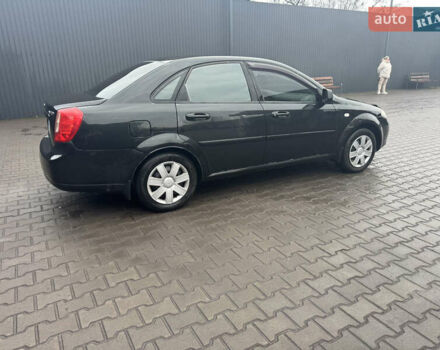 Черный Дэу Джентра, объемом двигателя 1.49 л и пробегом 267 тыс. км за 4400 $, фото 1 на Automoto.ua