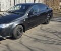 Черный Дэу Джентра, объемом двигателя 1.5 л и пробегом 161 тыс. км за 4400 $, фото 1 на Automoto.ua