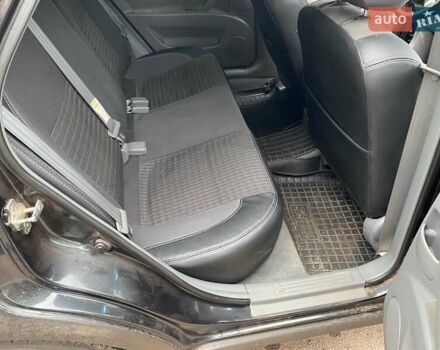 Черный Дэу Джентра, объемом двигателя 1.49 л и пробегом 82 тыс. км за 6000 $, фото 9 на Automoto.ua