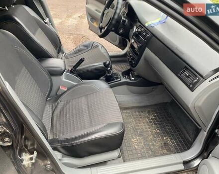 Черный Дэу Джентра, объемом двигателя 1.49 л и пробегом 82 тыс. км за 6000 $, фото 8 на Automoto.ua