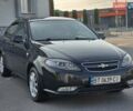 Черный Дэу Джентра, объемом двигателя 1.5 л и пробегом 180 тыс. км за 3999 $, фото 4 на Automoto.ua