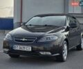Черный Дэу Джентра, объемом двигателя 1.5 л и пробегом 180 тыс. км за 3999 $, фото 2 на Automoto.ua