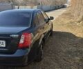 Черный Дэу Джентра, объемом двигателя 1.5 л и пробегом 161 тыс. км за 4400 $, фото 2 на Automoto.ua