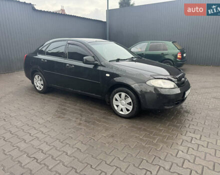 Черный Дэу Джентра, объемом двигателя 1.49 л и пробегом 267 тыс. км за 4400 $, фото 2 на Automoto.ua