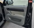 Черный Дэу Джентра, объемом двигателя 1.5 л и пробегом 180 тыс. км за 3999 $, фото 28 на Automoto.ua