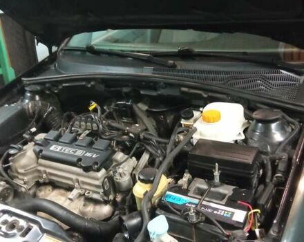 Черный Дэу Джентра, объемом двигателя 1.49 л и пробегом 122 тыс. км за 6750 $, фото 13 на Automoto.ua