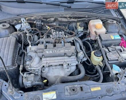 Черный Дэу Джентра, объемом двигателя 1.49 л и пробегом 203 тыс. км за 4700 $, фото 8 на Automoto.ua