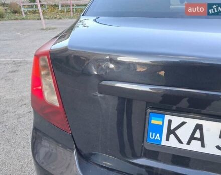 Черный Дэу Джентра, объемом двигателя 1.49 л и пробегом 203 тыс. км за 4700 $, фото 5 на Automoto.ua