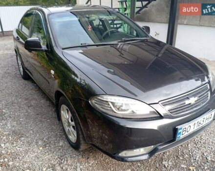 Черный Дэу Джентра, объемом двигателя 1.5 л и пробегом 88 тыс. км за 5500 $, фото 1 на Automoto.ua