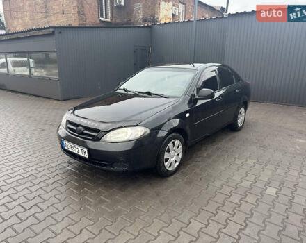 Черный Дэу Джентра, объемом двигателя 1.49 л и пробегом 267 тыс. км за 4400 $, фото 1 на Automoto.ua