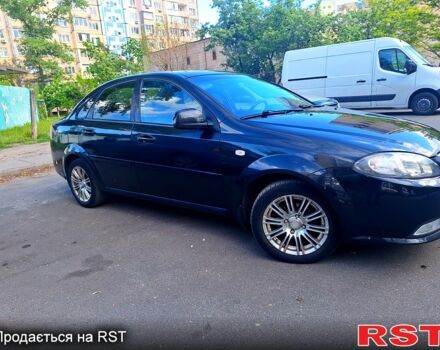 Чорний Деу Джентра, об'ємом двигуна 1.5 л та пробігом 119 тис. км за 5700 $, фото 1 на Automoto.ua