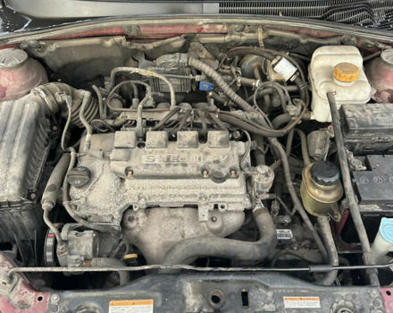 Червоний Деу Джентра, об'ємом двигуна 1.49 л та пробігом 192 тис. км за 6700 $, фото 4 на Automoto.ua