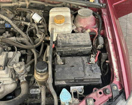 Червоний Деу Джентра, об'ємом двигуна 1.49 л та пробігом 192 тис. км за 6700 $, фото 2 на Automoto.ua