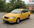 Жовтий Деу Джентра, об'ємом двигуна 1.49 л та пробігом 180 тис. км за 3450 $, фото 1 на Automoto.ua