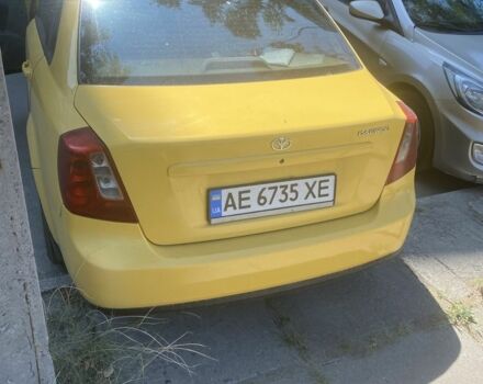 Желтый Дэу Джентра, объемом двигателя 1.5 л и пробегом 320 тыс. км за 2900 $, фото 4 на Automoto.ua