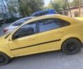 Желтый Дэу Джентра, объемом двигателя 1.5 л и пробегом 310 тыс. км за 2350 $, фото 7 на Automoto.ua