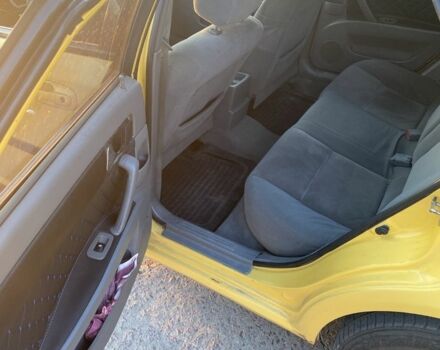 Желтый Дэу Джентра, объемом двигателя 1.5 л и пробегом 320 тыс. км за 2900 $, фото 2 на Automoto.ua