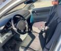 Сірий Деу Джентра, об'ємом двигуна 1.49 л та пробігом 48 тис. км за 6900 $, фото 10 на Automoto.ua