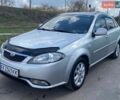 Серый Дэу Джентра, объемом двигателя 1.49 л и пробегом 200 тыс. км за 4000 $, фото 1 на Automoto.ua