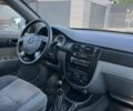 Синий Дэу Джентра, объемом двигателя 1.5 л и пробегом 215 тыс. км за 4500 $, фото 14 на Automoto.ua