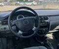 Синий Дэу Джентра, объемом двигателя 1.5 л и пробегом 215 тыс. км за 4500 $, фото 11 на Automoto.ua