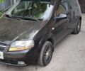 Черный Дэу Калос, объемом двигателя 1.5 л и пробегом 172 тыс. км за 4300 $, фото 1 на Automoto.ua