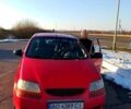 Красный Дэу Калос, объемом двигателя 1.4 л и пробегом 150 тыс. км за 2103 $, фото 1 на Automoto.ua