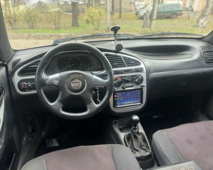 Серый Дэу Калос, объемом двигателя 1.6 л и пробегом 66 тыс. км за 1650 $, фото 6 на Automoto.ua