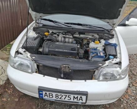 Белый Дэу Лачетти, объемом двигателя 1.6 л и пробегом 171 тыс. км за 2500 $, фото 13 на Automoto.ua