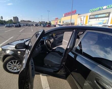 Чорний Деу Лачетті, об'ємом двигуна 1.8 л та пробігом 297 тис. км за 4200 $, фото 3 на Automoto.ua