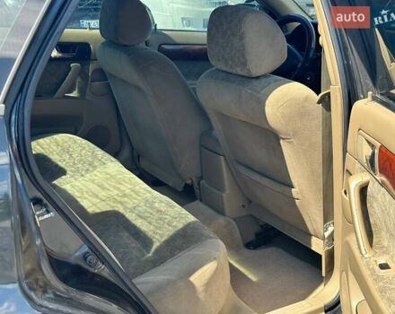 Чорний Деу Лачетті, об'ємом двигуна 1.5 л та пробігом 320 тис. км за 2499 $, фото 8 на Automoto.ua