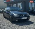 Чорний Деу Лачетті, об'ємом двигуна 1.5 л та пробігом 320 тис. км за 2499 $, фото 1 на Automoto.ua