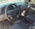 Красный Дэу Лачетти, объемом двигателя 1.4 л и пробегом 236 тыс. км за 3200 $, фото 1 на Automoto.ua