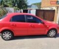 Красный Дэу Лачетти, объемом двигателя 1.4 л и пробегом 236 тыс. км за 3200 $, фото 4 на Automoto.ua