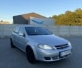 Сірий Деу Лачетті, об'ємом двигуна 1.6 л та пробігом 296 тис. км за 3500 $, фото 1 на Automoto.ua