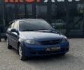 Синий Дэу Лачетти, объемом двигателя 1.4 л и пробегом 254 тыс. км за 3500 $, фото 1 на Automoto.ua