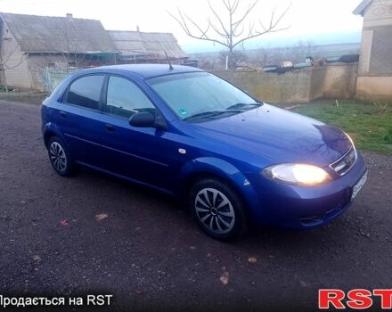 Синий Дэу Лачетти, объемом двигателя 1.4 л и пробегом 162 тыс. км за 3400 $, фото 1 на Automoto.ua