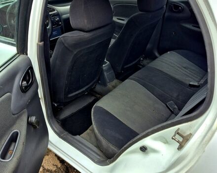 Белый Дэу Ланос, объемом двигателя 1.5 л и пробегом 220 тыс. км за 1850 $, фото 7 на Automoto.ua