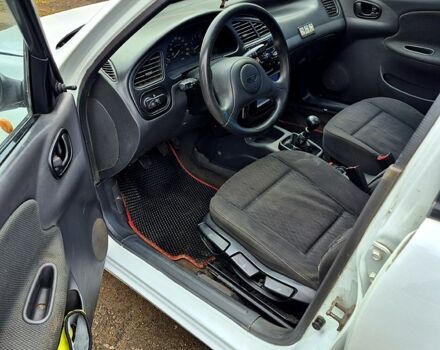 Белый Дэу Ланос, объемом двигателя 1.5 л и пробегом 220 тыс. км за 1850 $, фото 4 на Automoto.ua