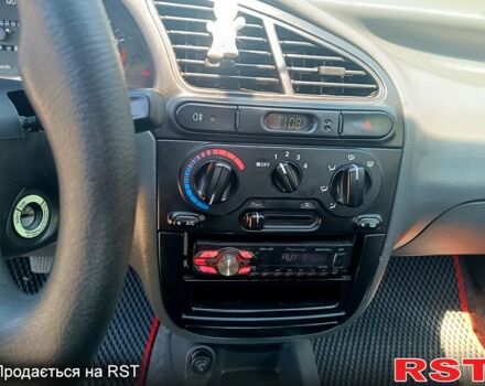 Белый Дэу Ланос, объемом двигателя 1.5 л и пробегом 126 тыс. км за 2700 $, фото 4 на Automoto.ua